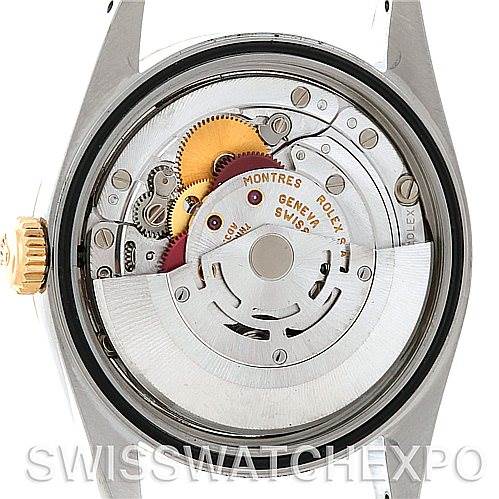 This image shows a close-up of the movement and internal mechanisms of a Rolex Datejust 16233 Men's Steel and Gold (two tone) Mother of Pearl Dial 16233 Men's Steel and Gold (two tone) Mother of Pearl Dial watch from the back.