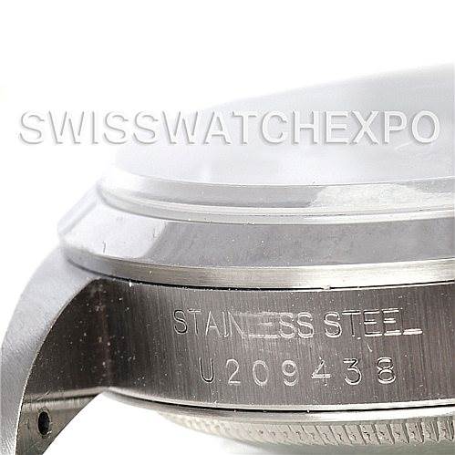 The image shows a close-up angle of the side of a Rolex Datejust 16200 Men's Stainless Steel White Dial 16200 Men's Stainless Steel White Dial watch, focusing on the case and engraving.