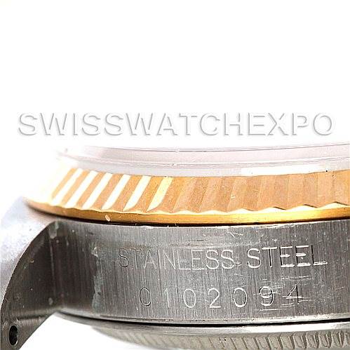 The image shows a close-up of the side of a Rolex Datejust 16233 Men's Steel and Gold (two tone) White Dial 16233 Men's Steel and Gold (two tone) White Dial watch, highlighting the stainless steel case and bezel.