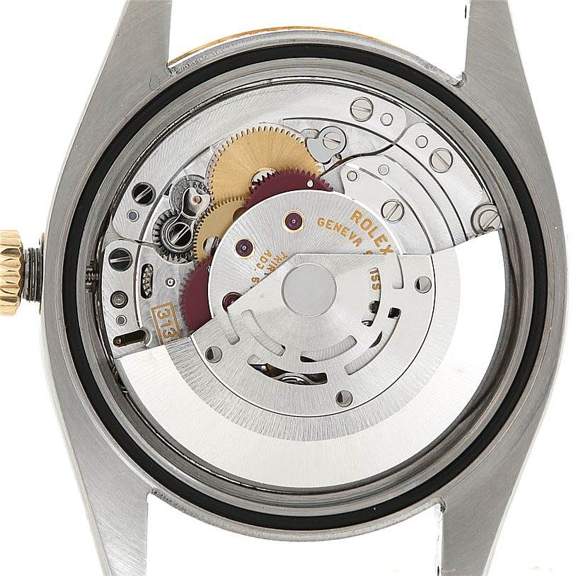 This image shows the back view of the Rolex Datejust 116203 Men's Stainless Steel Grey Dial 116203 Men's Stainless Steel Grey Dial movement, revealing the intricate internal mechanisms.