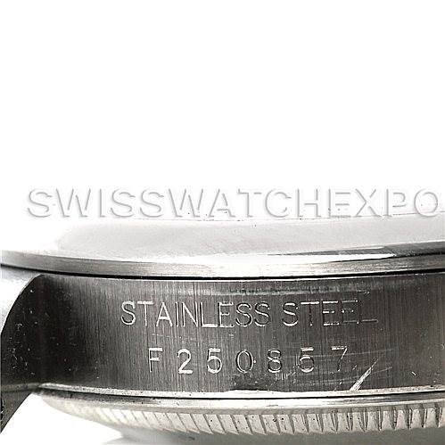 The image shows a close-up of the side of a stainless steel Rolex Datejust 16200 Men's Stainless Steel Black Dial 16200 Men's Stainless Steel Black Dial, focusing on the model number and material engraving.
