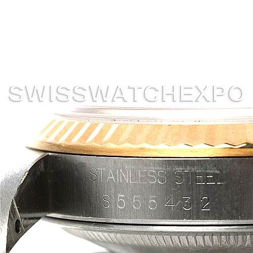 This image shows a side view of the case with visible serial and material engravings on a Rolex Datejust 16233 Men's Steel and Gold (two tone) Champagne Dial 16233 Men's Steel and Gold (two tone) Champagne Dial watch.