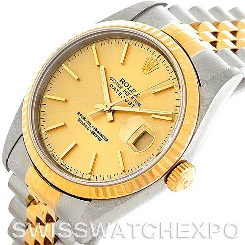 The image shows a close-up angle of the Rolex Datejust 16233 Men's Steel and Gold (two tone) Champagne Dial 16233 Men's Steel and Gold (two tone) Champagne Dial watch, highlighting the gold dial, bezel, and parts of the bracelet.