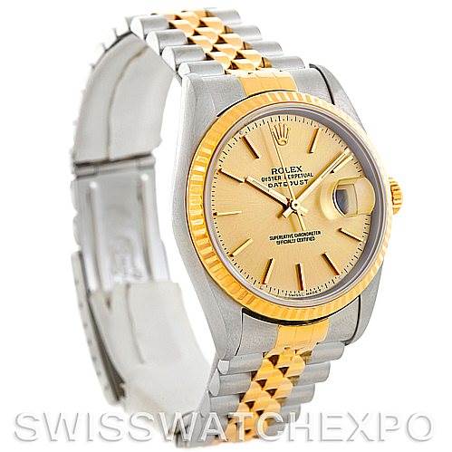 This image shows a Rolex Datejust 16233 Men's Steel and Gold (two tone) Champagne Dial 16233 Men's Steel and Gold (two tone) Champagne Dial watch at an angle highlighting its face, bezel, and part of the bracelet.