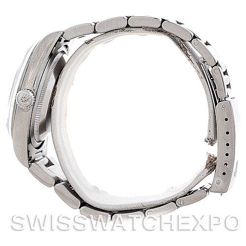 The image shows a side view of a Rolex Datejust Men's Stainless Steel Silver Dial Men's Stainless Steel Silver Dial watch, highlighting its bracelet, crown, and case profile.