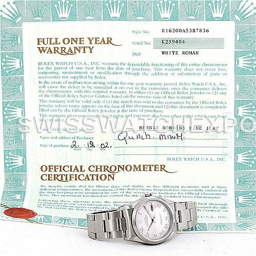 The image shows a Rolex Datejust Men's Stainless Steel Silver Dial Men's Stainless Steel Silver Dial watch placed on a warranty certificate, displaying its full length and face.