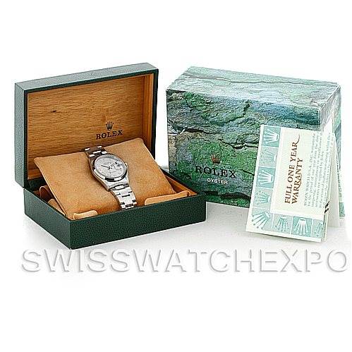The image shows a Rolex Datejust Men's Stainless Steel Silver Dial Men's Stainless Steel Silver Dial watch in its open wooden box, next to a closed Rolex box and a warranty card.