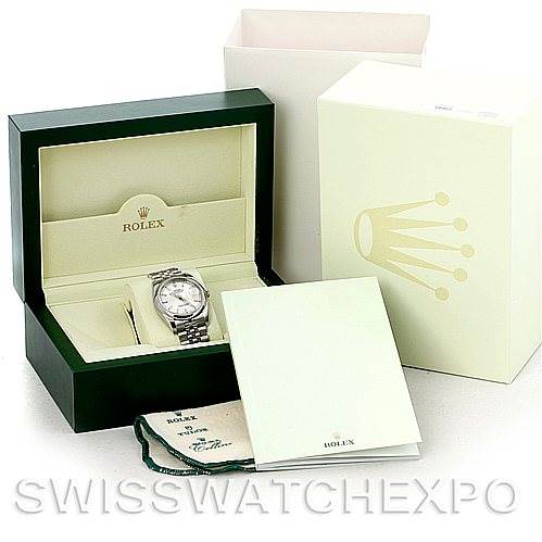 The image displays a Rolex Datejust 116200 Men's Stainless Steel Silver Dial 116200 Men's Stainless Steel Silver Dial watch in its original box, along with its packaging, booklets, and polishing cloth.