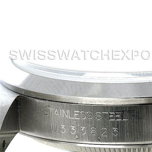 The image shows a close-up of the side view of the Rolex Datejust 16200 Men's Stainless Steel Beige Dial 16200 Men's Stainless Steel Beige Dial watch, highlighting its stainless steel case with an engraved serial number.