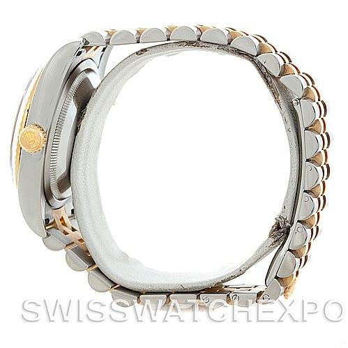 This image shows a side view of the Rolex Datejust 116233 Men
s Stainless Steel Black Dial 116233 Men
s Stainless Steel Black Dial watch, highlighting its band, clasp, and part of the case.