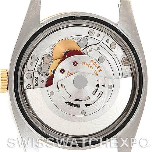 This image shows the movement and internal mechanisms of the Rolex Datejust 116233 Men
s Stainless Steel Black Dial 116233 Men
s Stainless Steel Black Dial model from a back angle with the case removed.