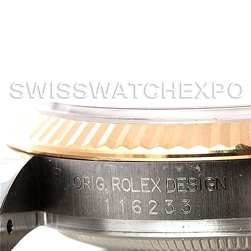 This image shows a close-up of the side of a Rolex Datejust 116233 Men
s Stainless Steel Black Dial 116233 Men
s Stainless Steel Black Dial watch, highlighting the bezel and engraved case details.