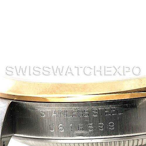 This image shows the side view of a Rolex Datejust 16203 Men
s Steel and Gold (two tone) Champagne Dial 16203 Men
s Steel and Gold (two tone) Champagne Dial, focusing on the stainless steel case with visible engravings.