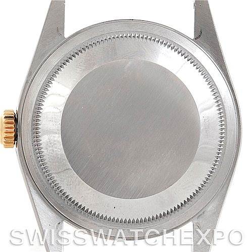 The image shows the case back of a Rolex Datejust 16203 Men
s Steel and Gold (two tone) Champagne Dial 16203 Men
s Steel and Gold (two tone) Champagne Dial watch, viewed from the rear.