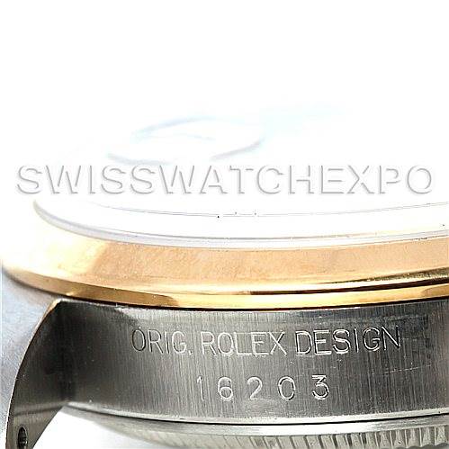 This image shows a close-up side view of a Rolex Datejust 16203 Men
s Steel and Gold (two tone) Champagne Dial 16203 Men
s Steel and Gold (two tone) Champagne Dial watch case with model number 16203 engraved, highlighting the bezel and casing.