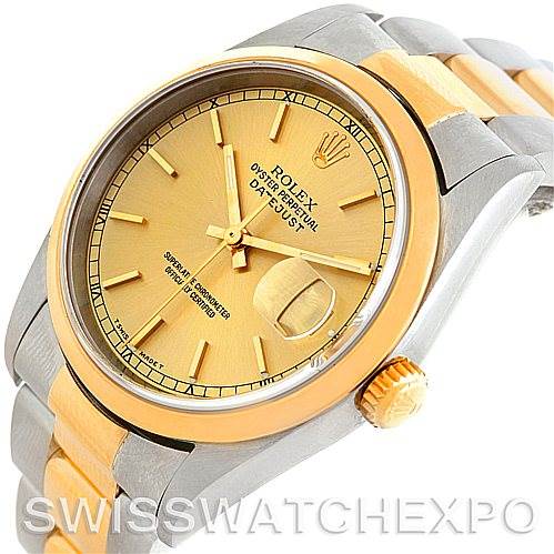 The image shows an angled view of a Rolex Datejust 16203 Men
s Steel and Gold (two tone) Champagne Dial 16203 Men
s Steel and Gold (two tone) Champagne Dial watch, displaying its gold dial, fluted bezel, stainless steel and yellow gold bracelet, and crown.