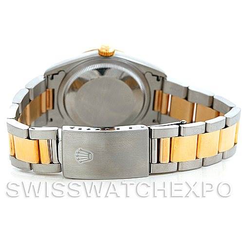 This image shows the back case and clasp of a Rolex Datejust 16203 Men
s Steel and Gold (two tone) Champagne Dial 16203 Men
s Steel and Gold (two tone) Champagne Dial watch, highlighting the two-tone bracelet design.