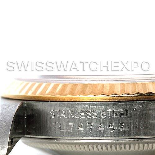 This image shows a close-up side view of the bezel and case of a Rolex Datejust 16233 Men
s Steel and Gold (two tone) Blue Dial 16233 Men
s Steel and Gold (two tone) Blue Dial watch, highlighting the model and material engraving.