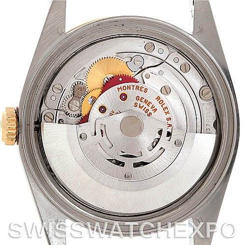 This image shows the movement and internal mechanism of a Rolex Datejust 16233 Men
s Steel and Gold (two tone) Blue Dial 16233 Men
s Steel and Gold (two tone) Blue Dial watch from a back angle with the caseback removed.