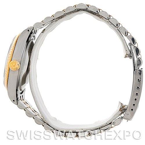 This image shows a side view of the Rolex Datejust 16233 Men
s Steel and Gold (two tone) Blue Dial 16233 Men
s Steel and Gold (two tone) Blue Dial watch, highlighting the case, bezel, and bracelet.