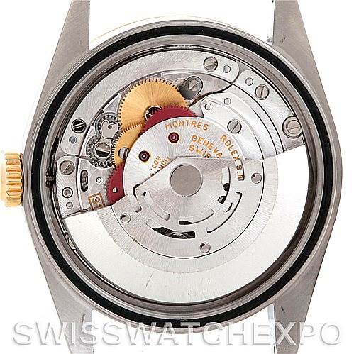 This image shows the internal mechanism and movement parts of a Rolex Datejust 16233 Men's Steel and Gold (two tone) Champagne Dial 16233 Men's Steel and Gold (two tone) Champagne Dial watch from a back angle with the case removed.