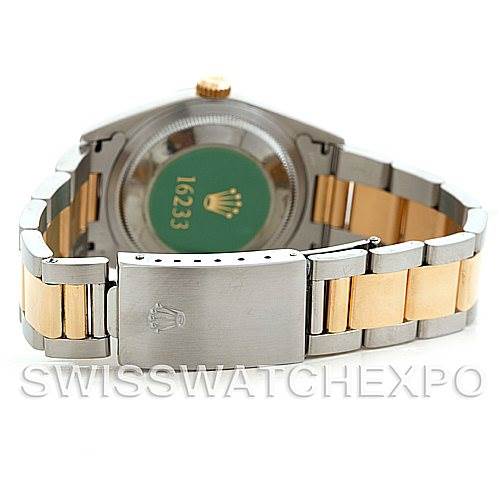 The image shows the backside and bracelet of a Rolex Datejust 16233 Men's Steel and Gold (two tone) Champagne Dial 16233 Men's Steel and Gold (two tone) Champagne Dial watch, displaying its clasp and case back.