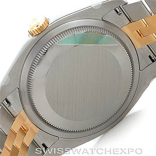 This image shows the back case and a portion of the bracelet of a Rolex Datejust 116233 Men's Stainless Steel Silver Dial 116233 Men's Stainless Steel Silver Dial watch.
