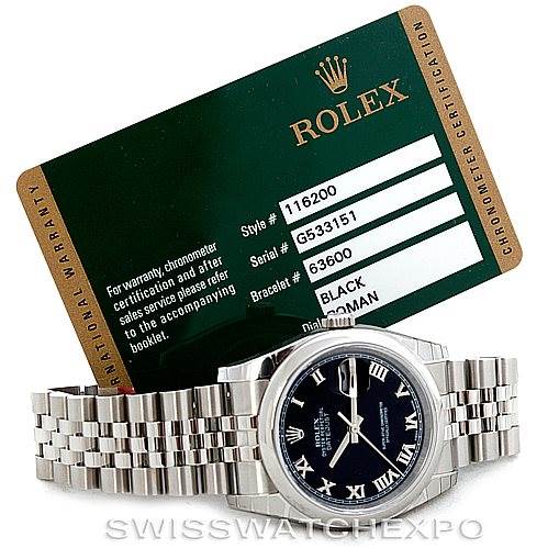 The image shows a Rolex Datejust 116200 Men
s Stainless Steel Black Dial 116200 Men
s Stainless Steel Black Dial watch laid flat with its warranty card in the background.