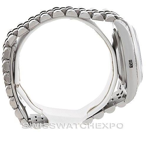 The image shows a side profile of a Rolex Datejust 116200 Men
s Stainless Steel Black Dial 116200 Men
s Stainless Steel Black Dial watch, highlighting the bracelet and part of the case.