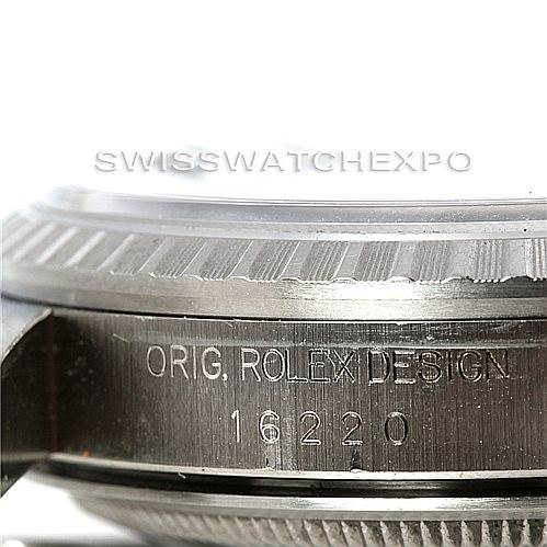 The image shows a close-up of the side of a Rolex Datejust 16220 Men's Stainless Steel Blue Dial 16220 Men's Stainless Steel Blue Dial watch, highlighting the model "16220" and "ORIG. ROLEX DESIGN."
