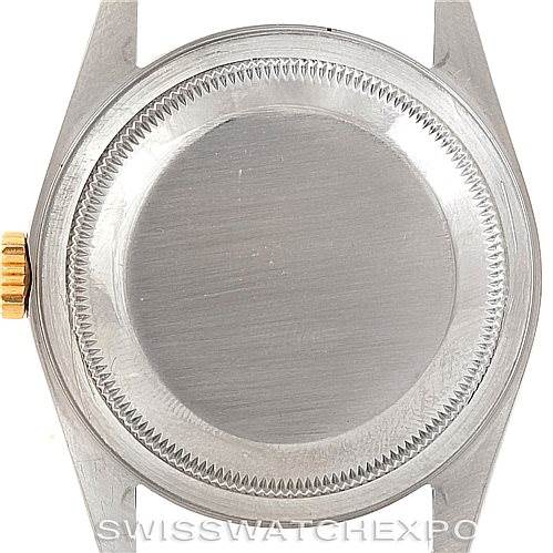 The image shows the case back and crown of a Rolex Datejust 16233 Men's Steel and Gold (two tone) Champagne Dial 16233 Men's Steel and Gold (two tone) Champagne Dial watch from a top-down angle.