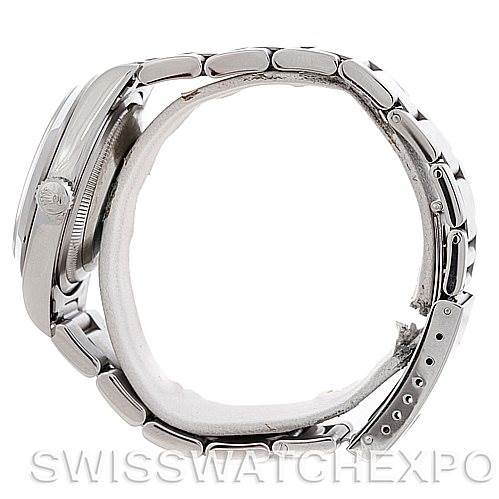 The image shows a side profile of the Rolex Datejust 16220 Men's Stainless Steel Beige Dial 16220 Men's Stainless Steel Beige Dial watch, highlighting its case, crown, and bracelet.