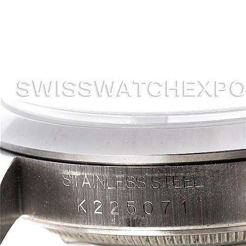 The image shows a close-up of the side engraving and case of a Rolex Datejust 16220 Men's Stainless Steel Beige Dial 16220 Men's Stainless Steel Beige Dial watch.