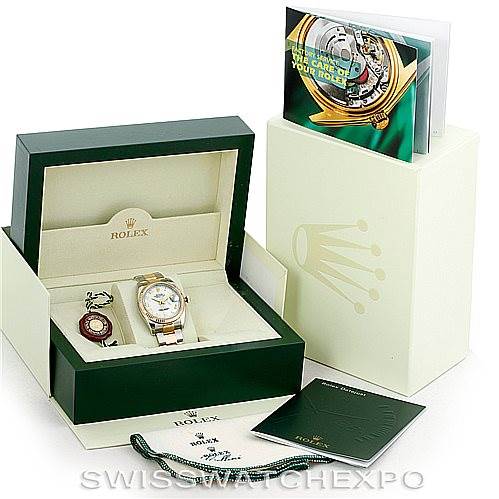 The image shows a Rolex Datejust 116233 Men's Stainless Steel White Dial 116233 Men's Stainless Steel White Dial watch and its accessories, including the box, manuals, and tags, displayed at an angle.