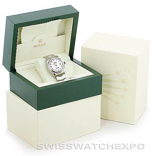 The image shows a Rolex Datejust 116200 Men
s Stainless Steel White Dial 116200 Men
s Stainless Steel White Dial watch in its open green and cream presentation box with the outer cream box beside it.