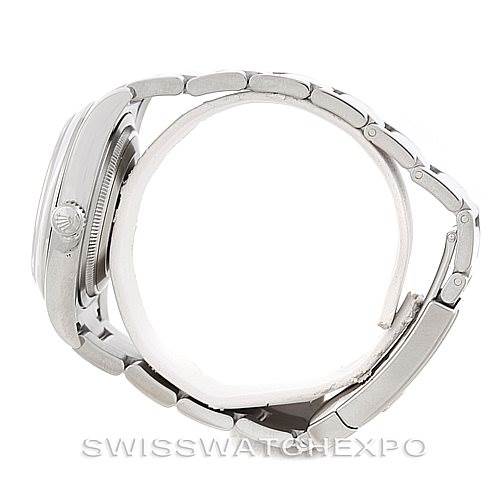 The image shows a side view of a Rolex Datejust 116200 Men
s Stainless Steel White Dial 116200 Men
s Stainless Steel White Dial watch, highlighting the case, crown, and bracelet.