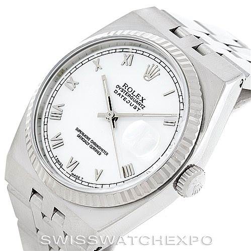 The Rolex Datejust 17014 Men's Stainless Steel White Dial 17014 Men's Stainless Steel White Dial watch is shown at a slight tilt, displaying its white dial, Roman numeral markers, fluted bezel, and crown.
