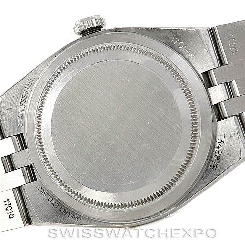 This image shows the back case and part of the bracelet of a Rolex Datejust 17014 Men's Stainless Steel White Dial 17014 Men's Stainless Steel White Dial watch.