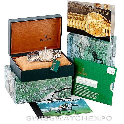 The image shows a Rolex Datejust 16233 Men's Steel and Gold (two tone) Beige Dial 16233 Men's Steel and Gold (two tone) Beige Dial watch with its original packaging, box, warranty card, and booklets at an angled view.