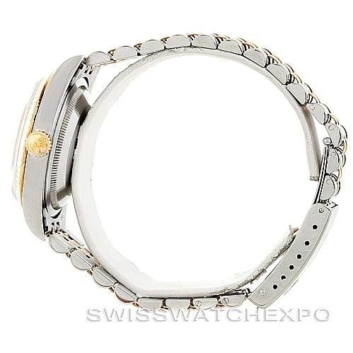 The image shows a side angle of a Rolex Datejust 16233 Men's Steel and Gold (two tone) Beige Dial 16233 Men's Steel and Gold (two tone) Beige Dial watch, highlighting the case, crown, and metal bracelet.