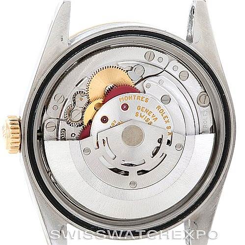 The image shows the back view of a Rolex Datejust 16233 Men's Steel and Gold (two tone) Beige Dial 16233 Men's Steel and Gold (two tone) Beige Dial watch, revealing its internal mechanism and rotor.