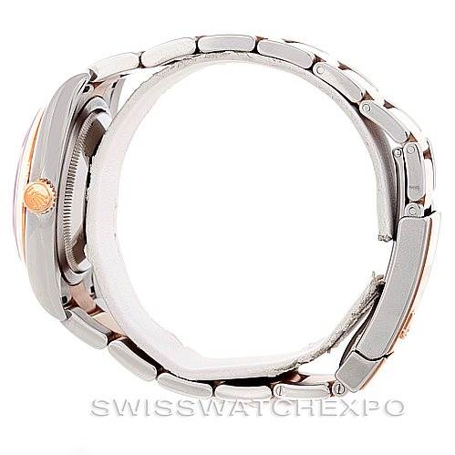 This image shows a Rolex Datejust 116201 Men's Steel and Gold (two tone) Black Dial 116201 Men's Steel and Gold (two tone) Black Dial watch from a side angle, highlighting its bracelet and crown.