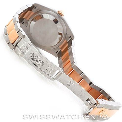 The image shows the back view and inner clasp of a Rolex Datejust 116201 Men's Steel and Gold (two tone) Black Dial 116201 Men's Steel and Gold (two tone) Black Dial watch, highlighting its two-tone bracelet.