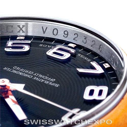 The image shows a close-up of the Rolex Datejust 116201 Men's Steel and Gold (two tone) Black Dial 116201 Men's Steel and Gold (two tone) Black Dial dial and rehaut, featuring part of the serial number and the numerals 5, 6, 7, and 8.