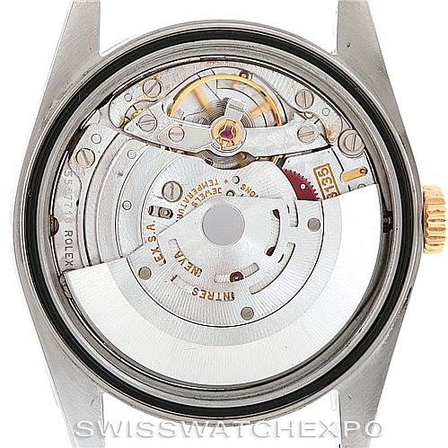 The image shows the inner mechanism and movement of a Rolex Datejust 16233 Men's Steel and Gold (two tone) Champagne Dial 16233 Men's Steel and Gold (two tone) Champagne Dial watch, viewed from the back with the caseback removed.