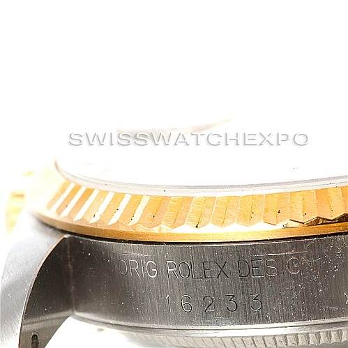 This close-up shot of a Rolex Datejust 16233 Men's Steel and Gold (two tone) Champagne Dial 16233 Men's Steel and Gold (two tone) Champagne Dial watch shows the bezel and part of the case with the model number "16233" engraved.