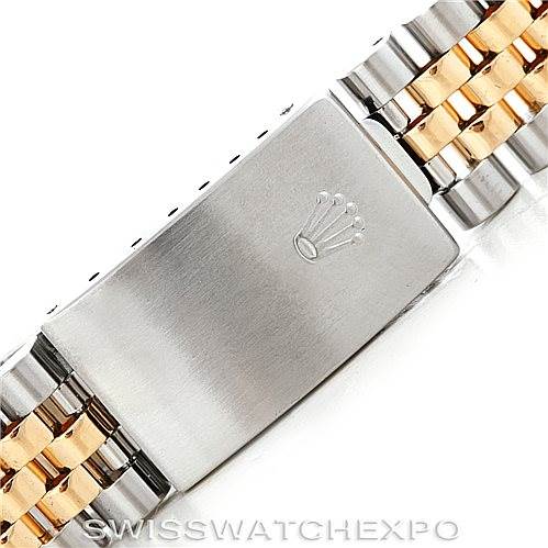 The image shows a close-up of a two-tone bracelet clasp of a Rolex Datejust 16233 Men's Steel and Gold (two tone) Champagne Dial 16233 Men's Steel and Gold (two tone) Champagne Dial.