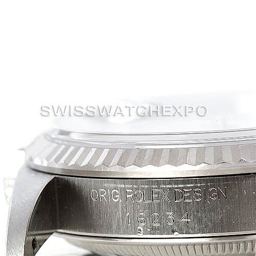This image shows a close-up of the side of a Rolex Datejust 16234 Men's Stainless Steel Silver Dial 16234 Men's Stainless Steel Silver Dial watch, highlighting the bezel and engraved case.