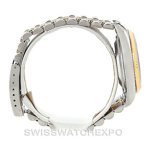 This image shows a side profile of a Rolex Datejust 16233 Men
s Steel and Gold (two tone) Beige Dial 16233 Men
s Steel and Gold (two tone) Beige Dial watch, highlighting the bracelet, case, and bezel.