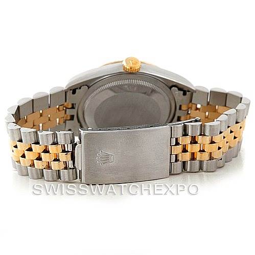 This image shows the back case and bracelet of a Rolex Datejust 16233 Men
s Steel and Gold (two tone) Beige Dial 16233 Men
s Steel and Gold (two tone) Beige Dial watch, featuring a two-tone metal design.